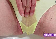 She soaks panties by pool then squirts wet pussy close-up in full piss movie