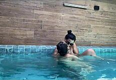 Busty girlfriend strap-on fucks boyfriend in swimming pool