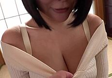 curvy busty japanese milf shakes huge natural tits seductively in bed