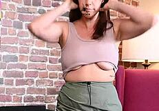 Alisha Adams tries outfits and gets boobs taped in sexy photoshoot