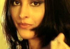 sensual arab brunette milf dances erotically showing off exotic curves and legs
