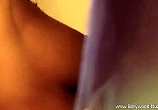 sensual arab brunette milf dances erotically showing off exotic curves and legs