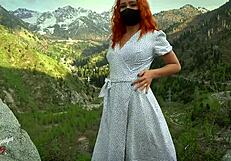beautiful redhead masturbates solo outdoors in nature wearing cute dress