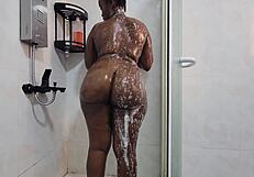 peeking on huge ass babe bathing fucking herself hard in steamy shower reality