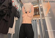 naked in public fitting room flashing shaved pussy. brunette tries lingerie with open curtain voyeur style