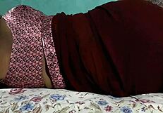 sanjana aunty's juicy ass sways teasingly under tight maroon saree