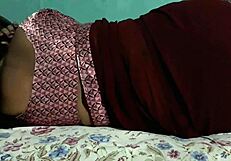 sanjana aunty's juicy ass sways teasingly under tight maroon saree
