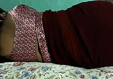 sanjana aunty's juicy ass sways teasingly under tight maroon saree