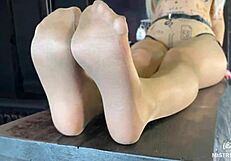 look at my beautiful feet in flesh-toned nylons teasing your desires up close