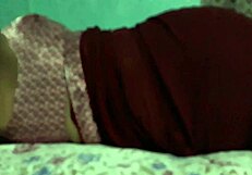 sanjana aunty's juicy ass sways teasingly under tight maroon saree