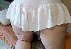 madrasta bends over in see-through dress flashing natural tits and bare pussy