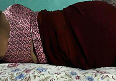 sanjana aunty's juicy ass sways teasingly under tight maroon saree