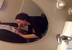 SHORT HAIRED WIFE DROPS TO KNEES FOR BATHROOM COCK SUCKING SESSION