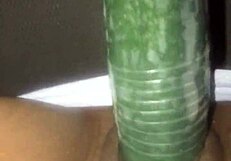 kissesxxx teases her wet pussy with cucumber outdoors till she squirts