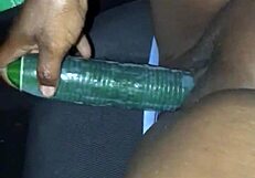 kissesxxx teases her wet pussy with cucumber outdoors till she squirts