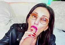 Milf in glasses deepthroats dildo while toying big tits seductively