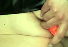 Curvy brunette squirts wildly before anal plunge