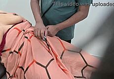 Indian Doctor Thoroughly Checks Lady Patient in Clinic