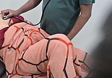 Indian Doctor Thoroughly Checks Lady Patient in Clinic