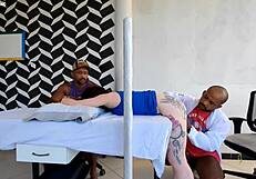 DOCTOR POUNDS PATIENT ASS BESIDE HUSBAND WHO DOESN'T NOTICE!