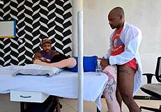 DOCTOR POUNDS PATIENT ASS BESIDE HUSBAND WHO DOESN'T NOTICE!