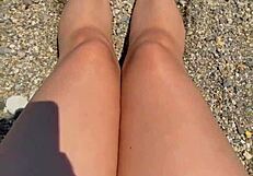check out this curvy Asian brunette's huge natural tits and soft soles teasing on the beach