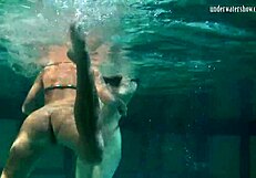 Russian Lesbians Kiss Underwater in Juicy Pool Play?