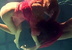 Russian Lesbians Kiss Underwater in Juicy Pool Play?