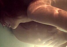 Russian Lesbians Kiss Underwater in Juicy Pool Play?