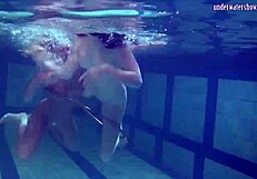 Russian Lesbians Kiss Underwater in Juicy Pool Play?