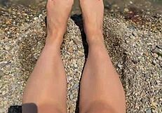 check out this curvy Asian brunette's huge natural tits and soft soles teasing on the beach