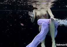 aneta's big tits soak wet in purple dress pool dive