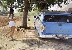 shameless monika fox bares pierced nipples and shaved pussy pissing naked outdoors under tree