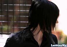Tattooed dyke babe takes lesbian strapon deep in close-up pussy fuck.