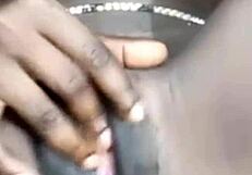 she fingers her smooth shaved wet pussy close up