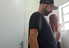 Public bathroom worker bends for brunette blowjob bang