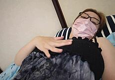 married japanese milf fingers her big tits desperately on bed