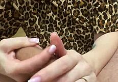 Watch this oiled penis swell huge from wife's submissive handjob massage and lipstick licking