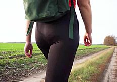Milf struts in skin-tight black leggings teasing her juicy ass during yoga voyeur session