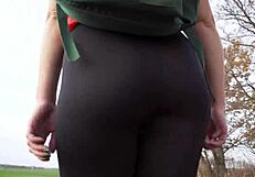 Milf struts in skin-tight black leggings teasing her juicy ass during yoga voyeur session