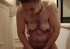 filthy slave pisses humiliates bound with dildo spanking!