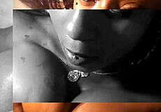 oiled black tits squeezing massive cock in titty fuck rhythm