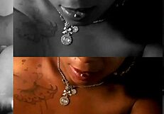 oiled black tits squeezing massive cock in titty fuck rhythm