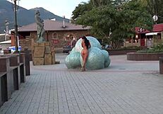 What happens when a naughty milf strips nude for a public street stroll?
