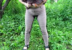 i watch milf soak her jeans pissing shaved pussy in public garden