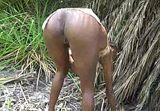 Check out skinny african tribe girl's narrow ass and small waist outdoors