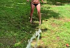 Farmers wife pisses outdoors soaking her plump saggy tits