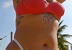 flashing my curves on the beach while filming to tease all the hungry guys