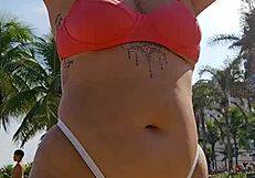 flashing my curves on the beach while filming to tease all the hungry guys