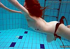 two hot shaved teen lesbians scissor underwater in pool